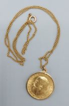 A George V full gold Sovereign dated 1913 within 9ct gold pendant mount with 9ct gold chain