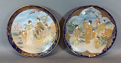 A pair of Satsuma earthenware dishes, each decorated with figures decorated with polychrome