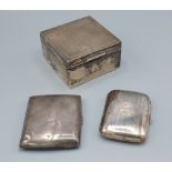 A Birmingham silver cigarette box together with two Birmingham silver cigarette cases of curved form