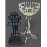 A wrought iron stick stand of pierced form, 74cms tall together with a wire work jardiniere