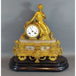 A 19th Century French white marble and gilded spelter mantle clock, the enamel dial with Roman