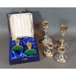 A pair of Birmingham silver candlesticks, 12.5cms tall together with two pairs of Birmingham