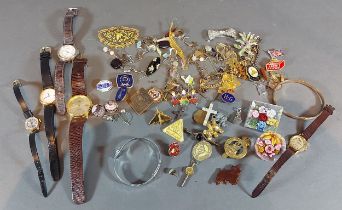 A collection of jewellery to include brooches, wristwatches and other jewellery