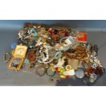 A large collection of jewellery to include brooches, necklaces and other jewellery