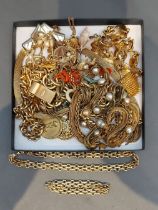 A gold plated necklace with matching bracelet by Christian Dior together with a collection of gold