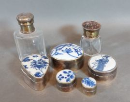 A collection of 925 silver and porcelain pill boxes together with a Birmingham silver and pique work