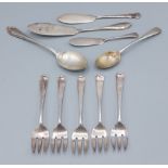 A set of five London silver dessert forks, together with three silver butter knives and two silver