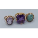 A 9ct gold cabochon stone set dress ring together with two other dress rings, 19.5gms
