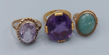 A 9ct gold cabochon stone set dress ring together with two other dress rings, 19.5gms