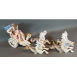 A Meissen porcelain group in the form of Neptune and Putti in a chariot with four seahorses, all