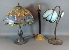 A Corinthian column table lamp together with a Tiffany style table lamp and another similar table