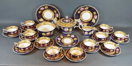 A 19th Century tea service comprising cups, saucers, plates and teapot all hand painted with