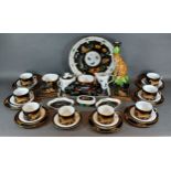 A tea service by Lynn Chase, 'Jaguar Jungle' to include cups and saucers, side plates, a