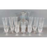 A set of six Waterford glass Champagne flutes together with a collection of other glassware