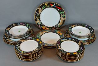 A part dinner service by Lynn Chase, 'Jaguar Jungle' to include eight dinner plates, sixteen side