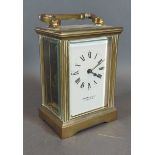 A French brass cased carriage clock retailed by Garrard and Co. with lever escapement