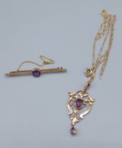 A 9ct gold Amethyst set pendant with chain together with a 9ct gold bar brooch set with a