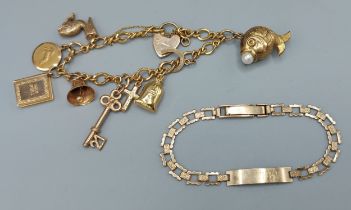 A 9ct gold charm bracelet set with many charms and padlock clasp together with a 9ct gold Identity
