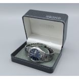 A Seiko stainless steel cased gentlemans wristwatch with stainless steel strap and within original
