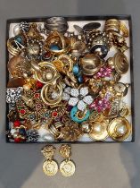 A pair of earclips by Gianni Versace together with a large collection of earclips