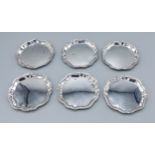 A set of six Birmingham silver coasters of shaped outline, 6ozs