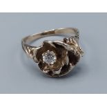 A 14ct gold ring set with a solitaire diamond, claw set, 3.5gms, ring size K