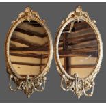 A pair of 19th Century French Girandole of oval form, each with three candle branches, 111cms x