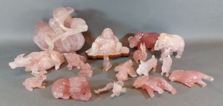 A Chinese Rose Quartz model in the form of Buddha together with a collection of similar Rose