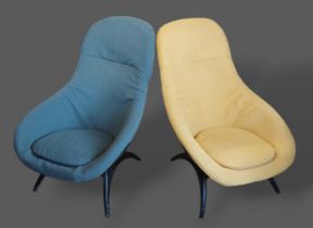 A pair of 20th Century tub shaped chairs by Lurashell with shaped supports