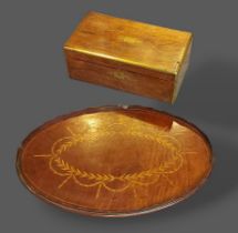 A 19th Century rosewood and brass inlaid writing box together with an oval inlaid tray