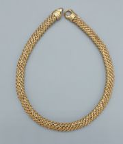 An 18ct gold necklace of interwoven form, 65gms, 42cms long