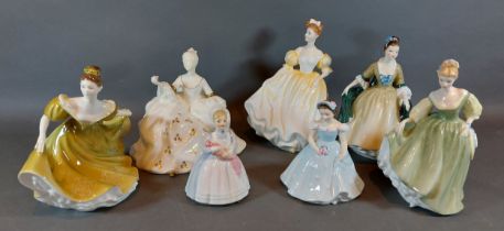 A Royal Doulton figurine Antoinette HN 2326, together with six other Royal Doulton figurines,