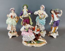 A group of four German porcelain figures together with a similar German porcelain group decorated in