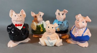 A set of five Wade Natwest money boxes in the form of pigs with original packaging