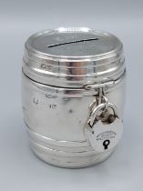 A George V silver money box in the form of a barrel with padlock lock, Birmingham 1922, 6.5cms tall