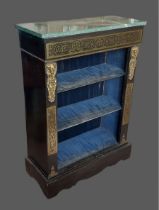 A 19th Century French ebonised brass inlaid pier cabinet, the variegated marble top above open
