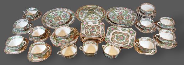 A Chinese Canton part tea service, comprising of a tureen, cups, saucers, and side plates all