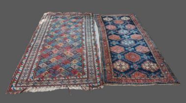 A Northwest Persian woollen runner with an all-over design upon a red, blue and cream ground