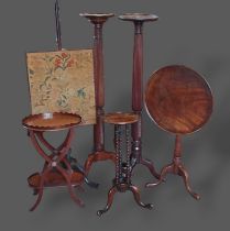 A 19th Century mahogany torchere together with another similar torchere, a firescreen and three