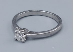 A white metal solitaire diamond ring, 0.33ct, claw set, 3.6gms, ring size O