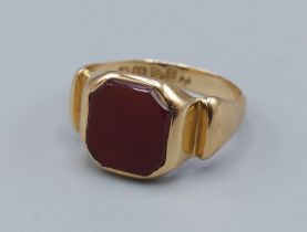 An 18ct gold stone set signet ring, 3.9gms, ring size O