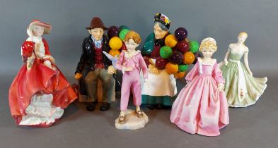 A Royal Doulton figurine The Balloon Seller HN 1315, together with The Balloon Man HN 1954, Top O'