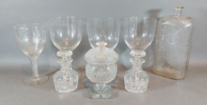 A set of three 19th Century large glass goblets together with another similar etched goblet and