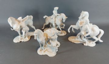 A Nymphenburg porcelain group in the form of a horse and rider together with three other similar