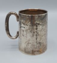 A Birmingham silver mug of tapered form, 7.5cms tall, 3ozs