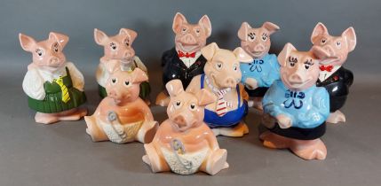 A collection of nine Wade Natwest money boxes in the from of pigs