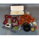 A collection of jewellery to include amber style necklaces and other jewellery