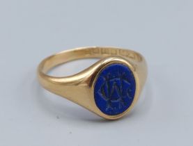 An 18ct gold signet ring set blue stone, 3.8gms, ring size Q