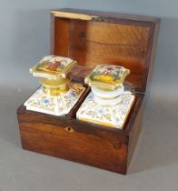 A 19th Century French rosewood decanter box, the hinged cover enclosing two Paris porcelain
