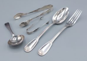 A George III silver caddy spoon by Peter, Ann and William Bateman together with two pairs of